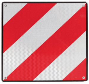 Placa V20 en vehículos que transportan cargas que sobresalen